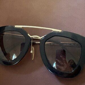 Black Women's Prada Sunglasses with gold trim